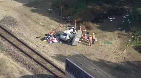 Woman dies after her car stops in front of Amtrak train – El Latino ...